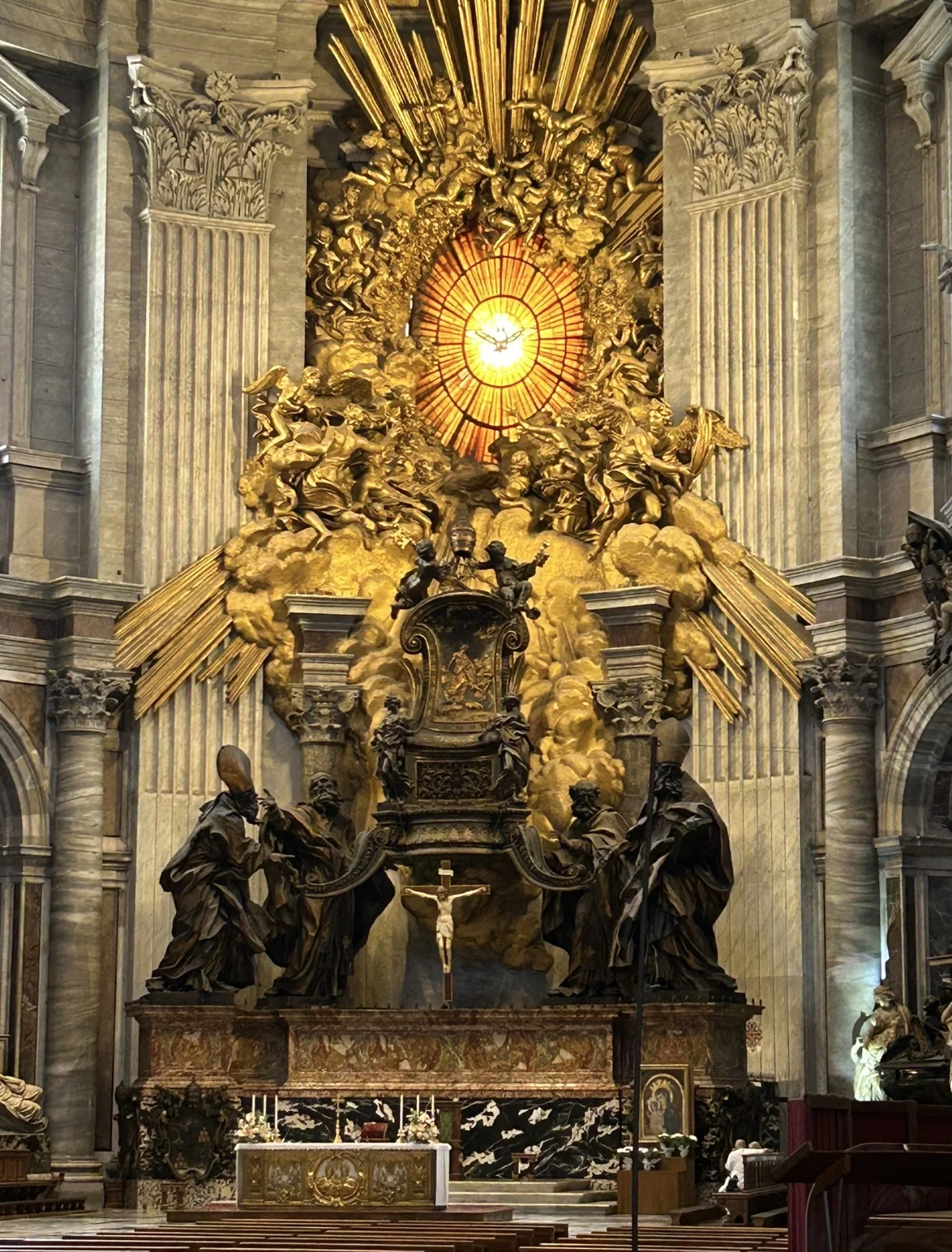 The Chair of St. Peter (Cathedra Petri) by Bernini, with the Holy Spirit window, in the apse of St. Peter's Basilica