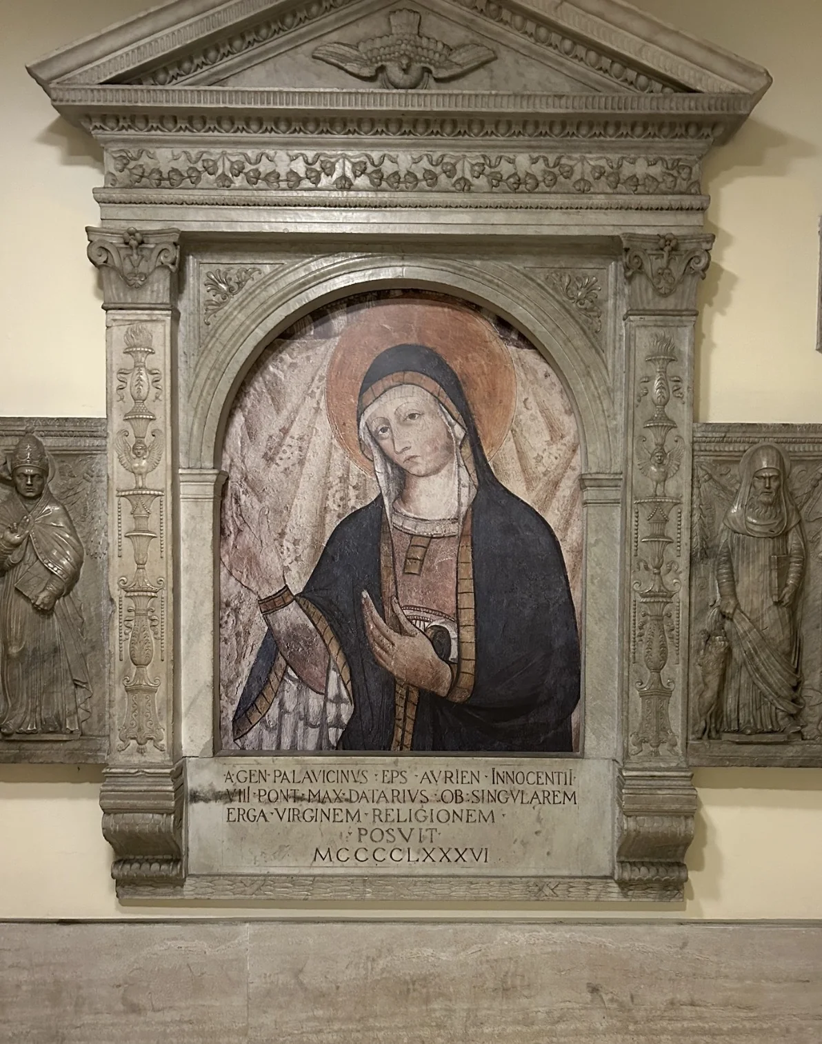A 1486 fresco of the Madonna in a marble aedicule in the Vatican Grottoes, set up by Bishop Palavicini under Innocent VIII