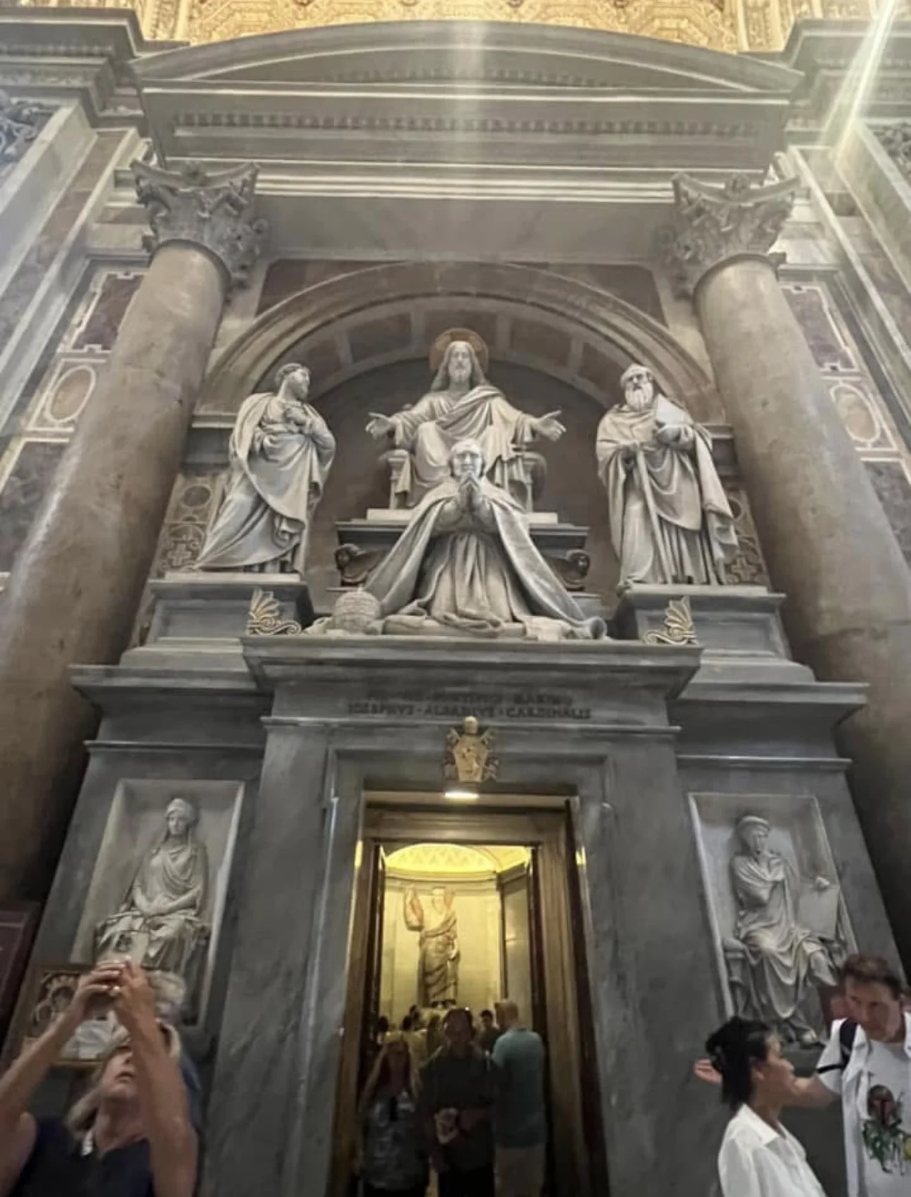 The monument to Pius VIII above the door to the sacristy in St. Peter's Basilica, with Christ enthroned and Sts. Peter and Paul