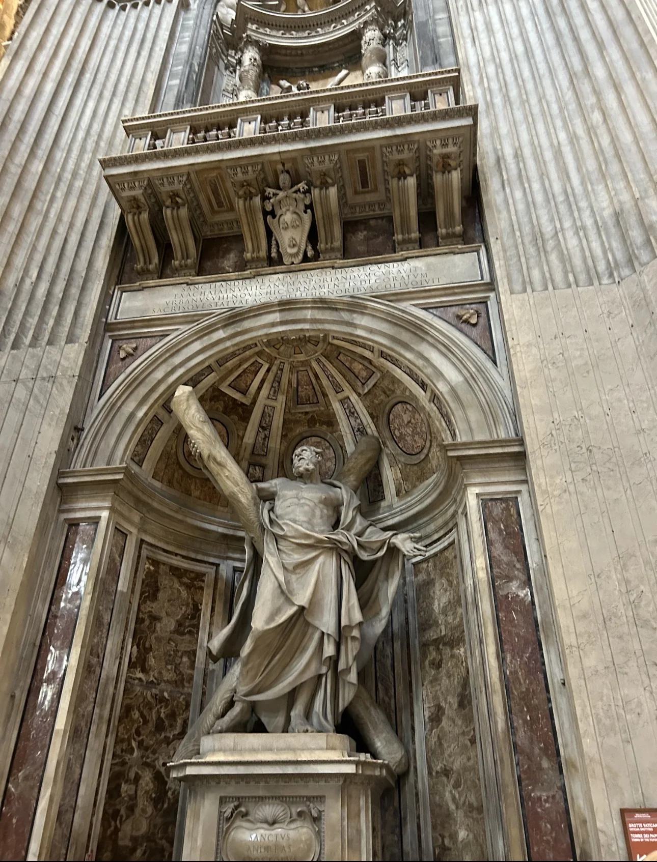 The statue of St. Andrew with his cross by François Duquesnoy, in a niche of a crossing pier in St. Peter's Basilica